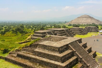 Explore the majestic pyramids of Teotihuacan from a bird's eye perspective, showcasing ancient architecture.